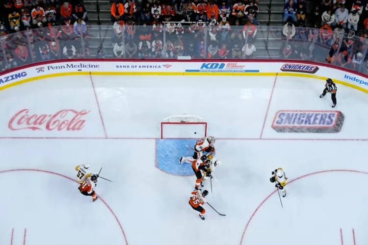 Penguins cruise in opener over Flyers